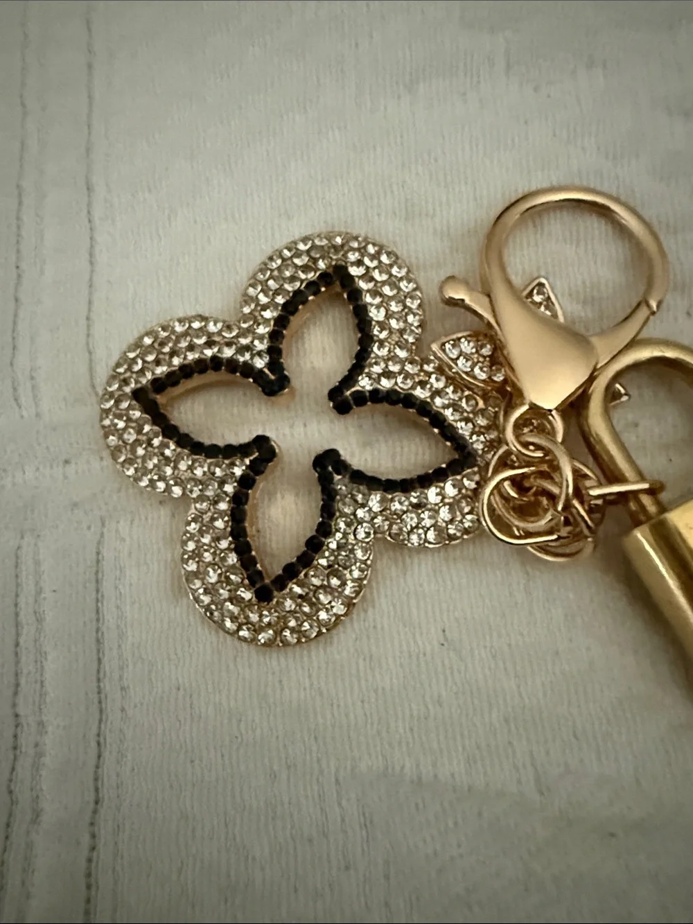 Louis Vuitton lock and key with unbranded gold and White Crystal Flower Charm
